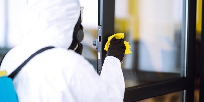Disinfecting a business door